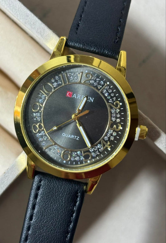 Huge black clock gold details